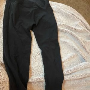 Black workout leggings with lace details on bottom